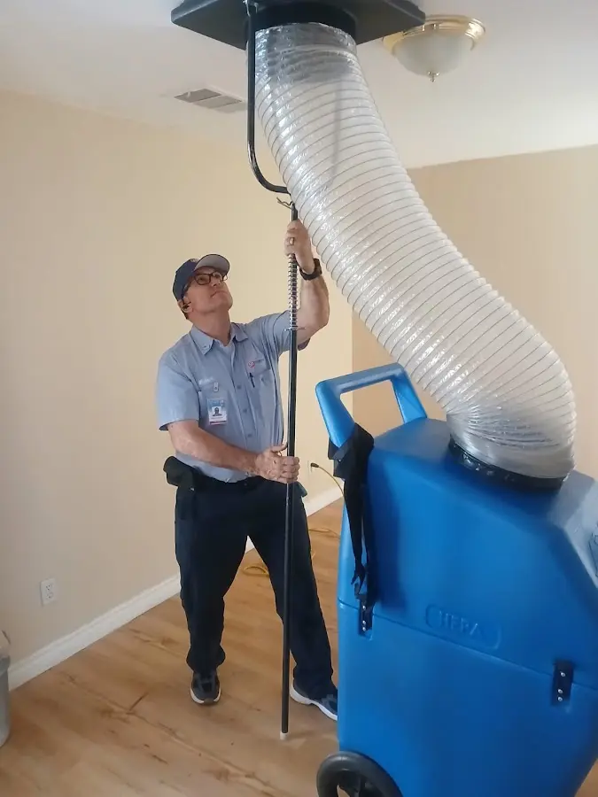 Mini Split Installation technician using HEPA equipment in Huntington